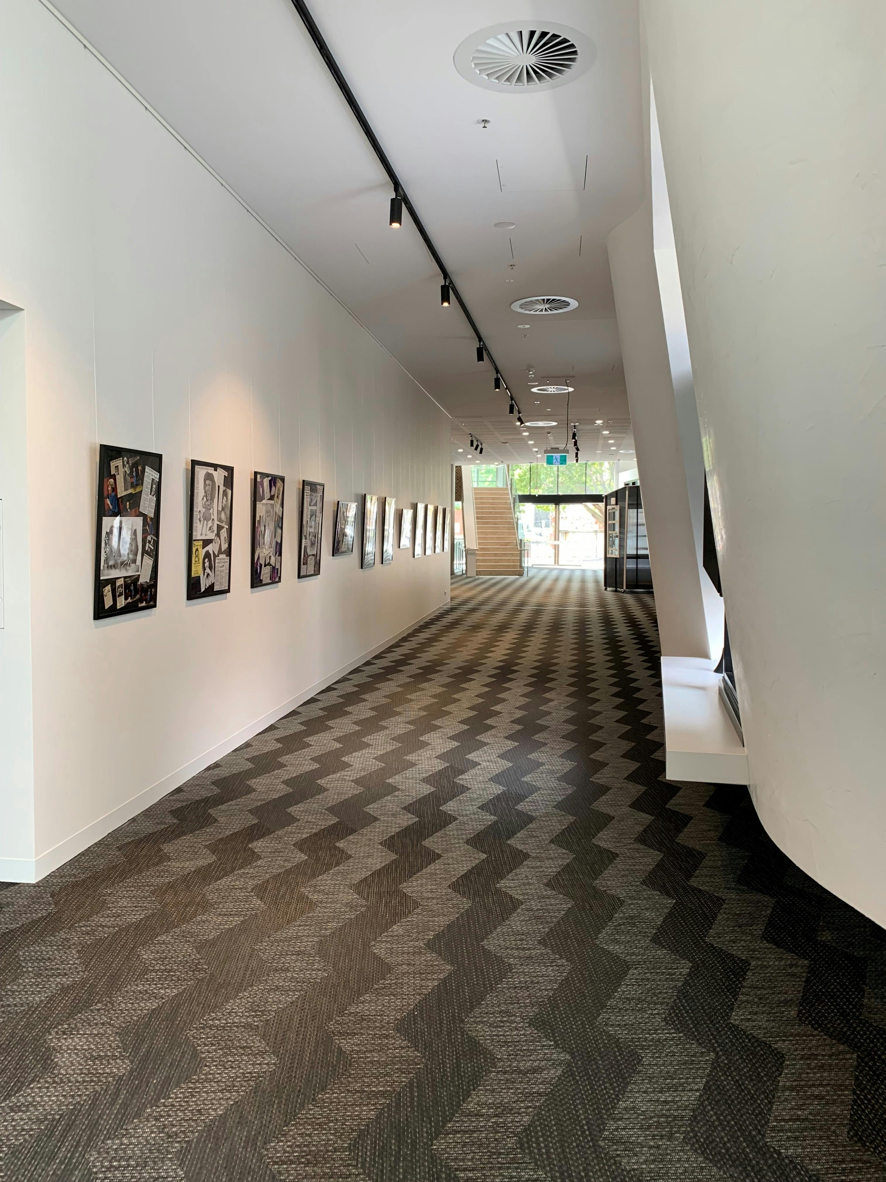 Interior gallery photo looking east to maindoor on Crawford street