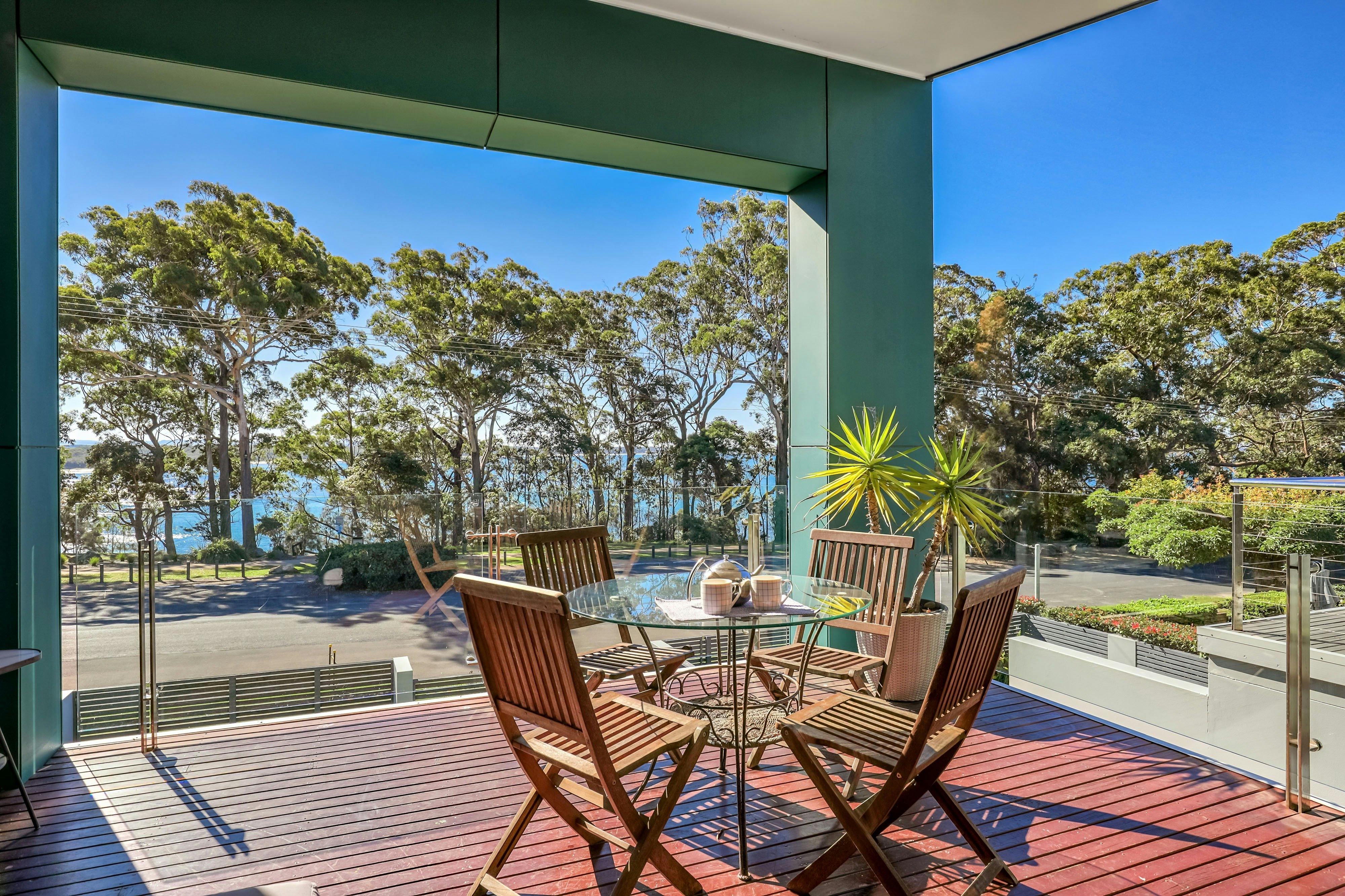 Sunny balcony with water views