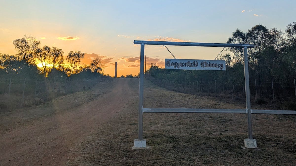 Copperfield chimney and sign at sunset