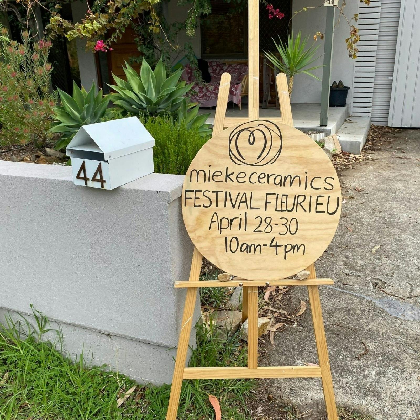 Signage designation the showing artist on the trail.