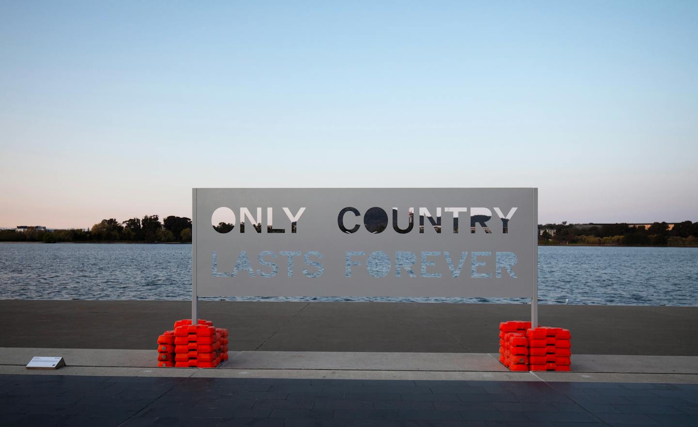 A metal sign that reads 