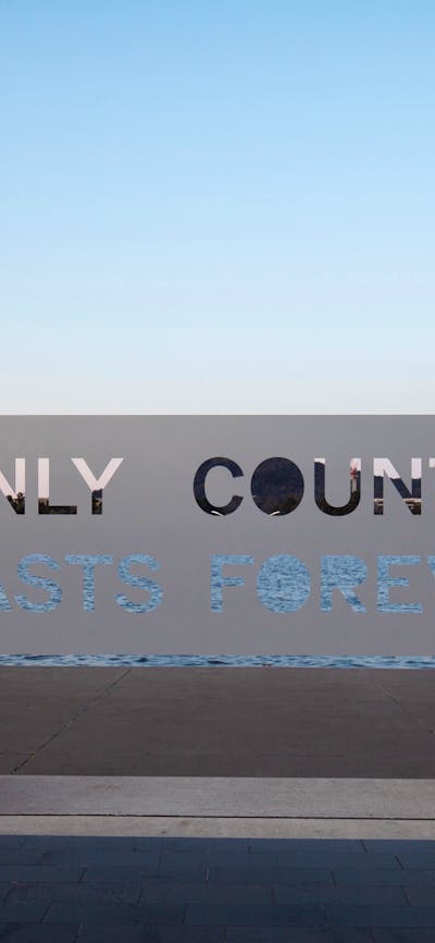 A metal sign that reads
