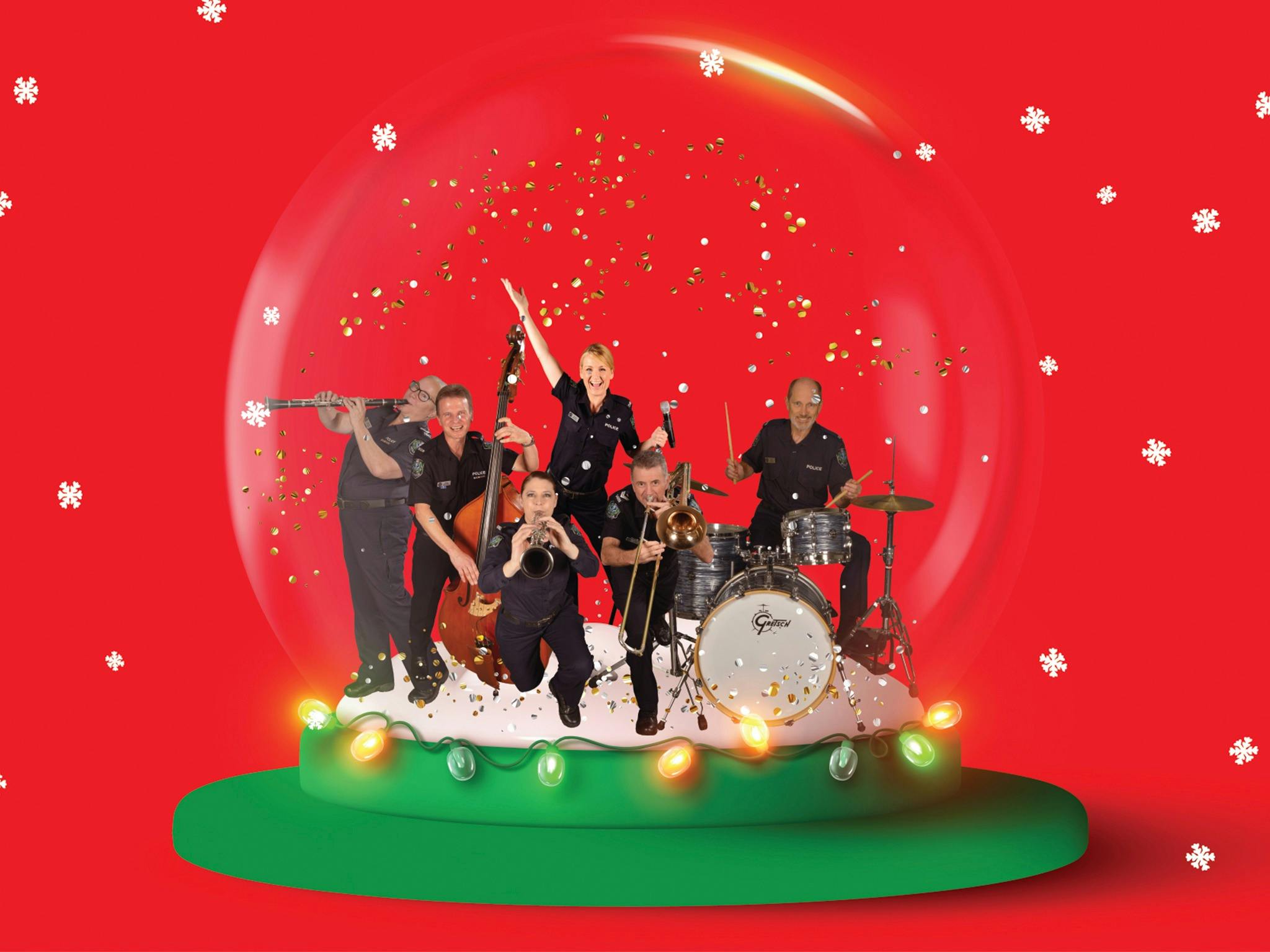 A stylised image of the SA Police Band inside a christmas themes snow globe.