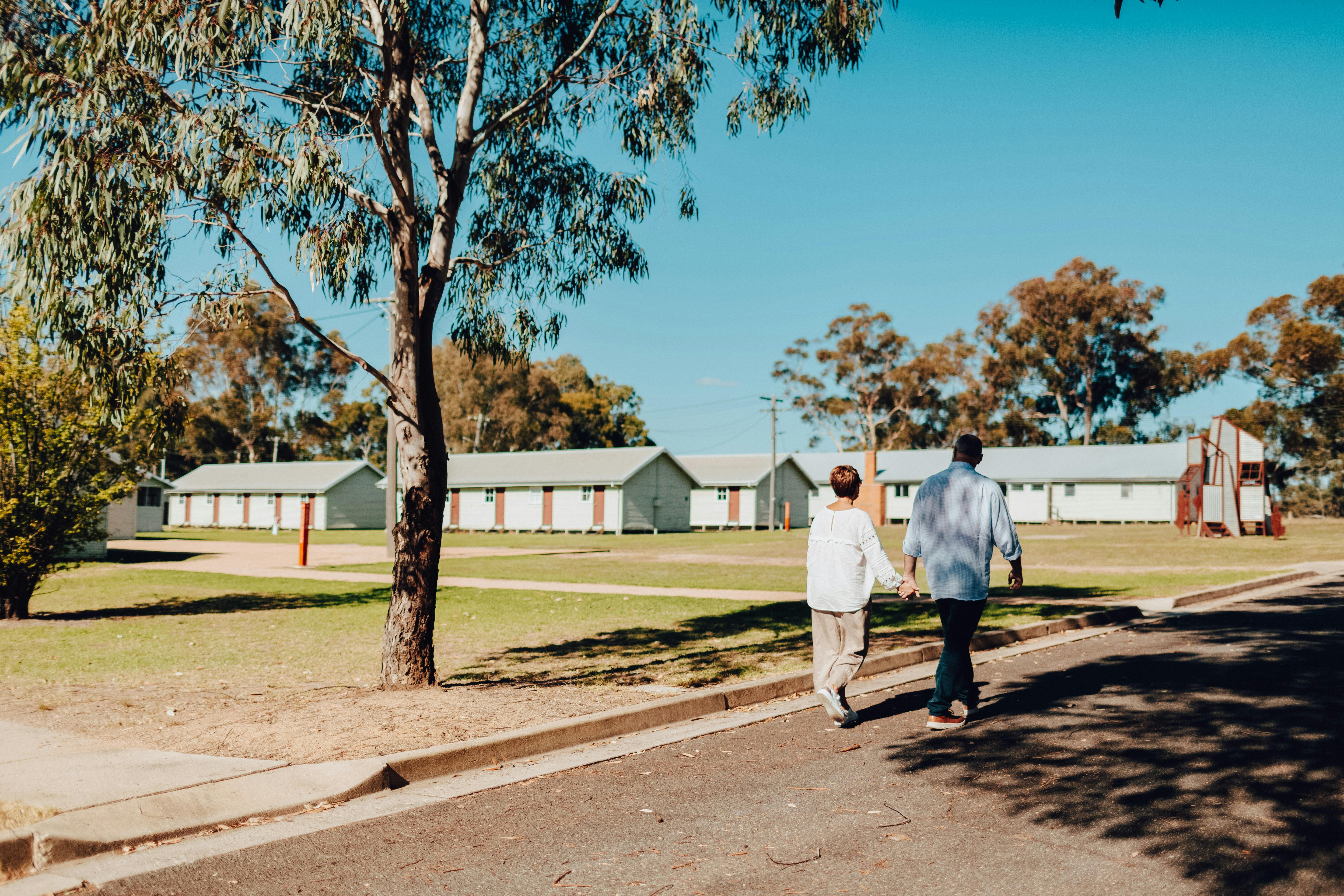 two people walking at the Bonegilla Migrant Experience