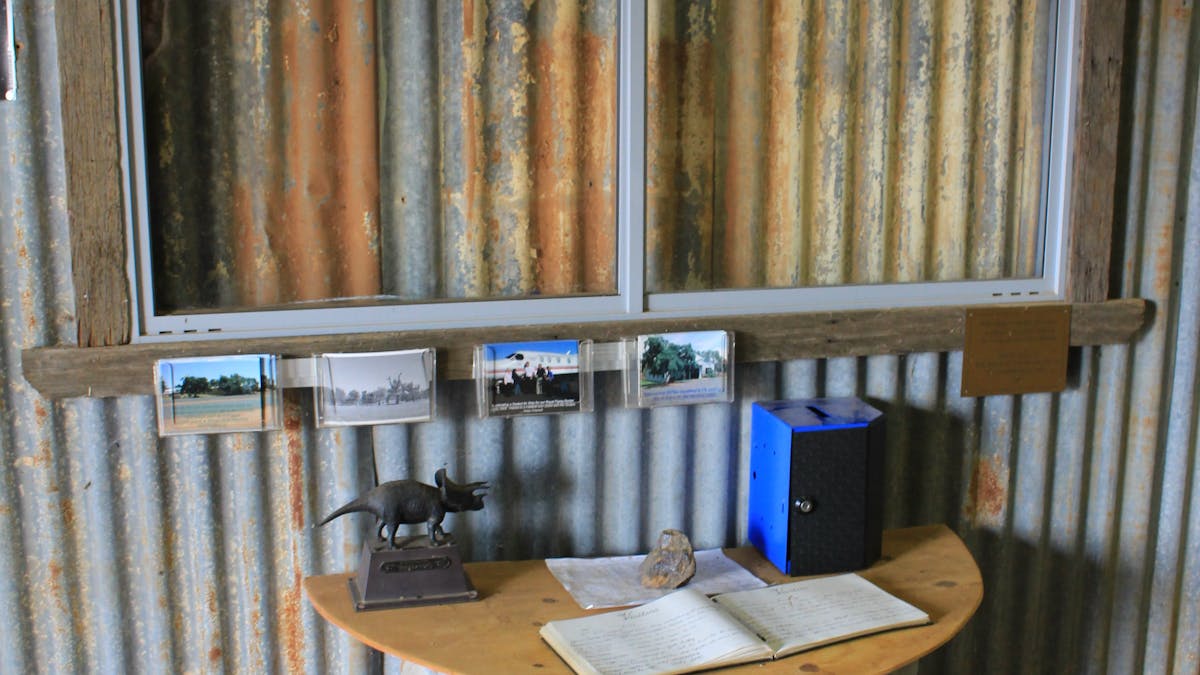 Old Metal Tank, visitor book, corrugated Iron wall.