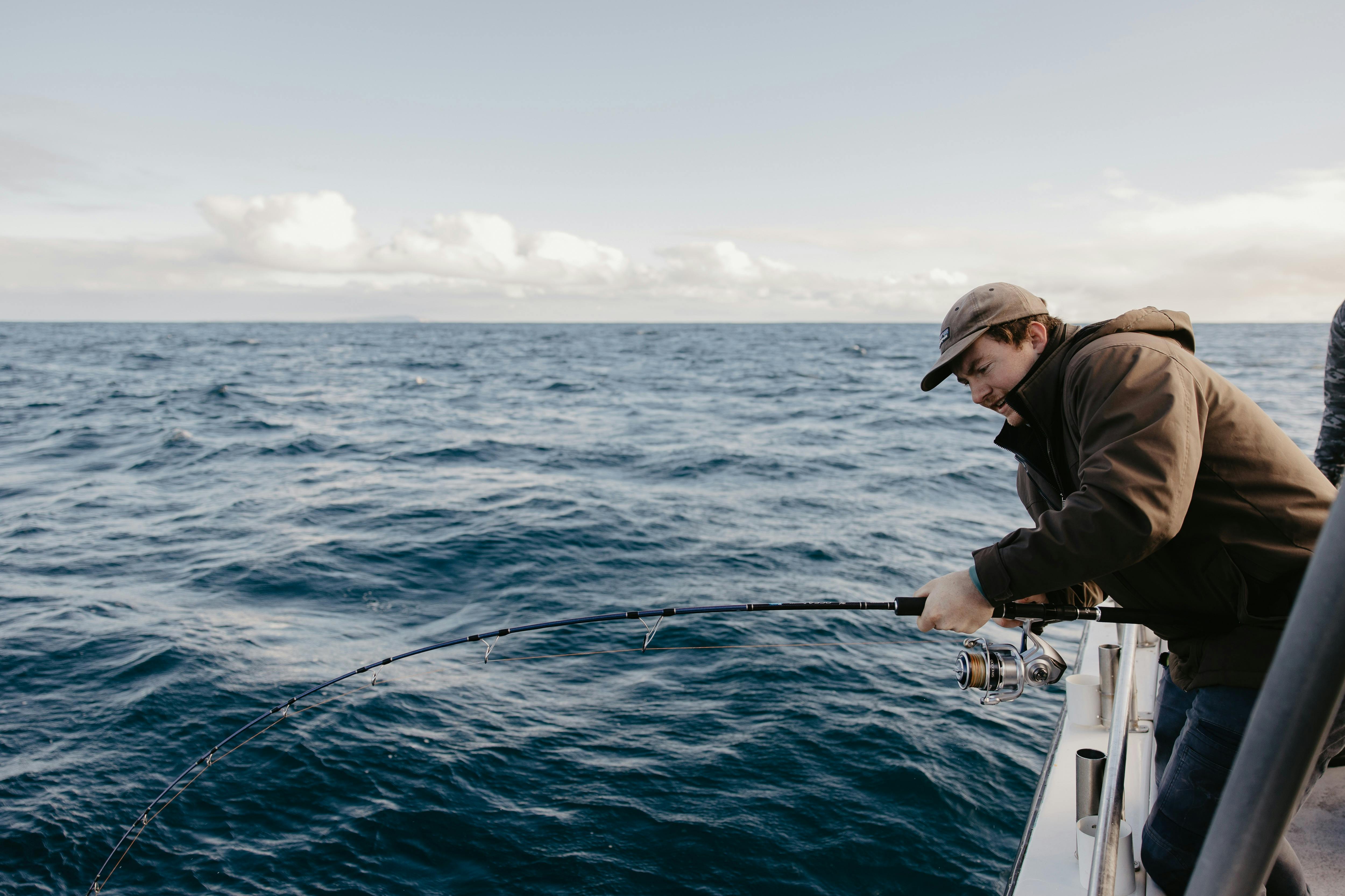 Angler onboard Reef Encounters Fishing Charters