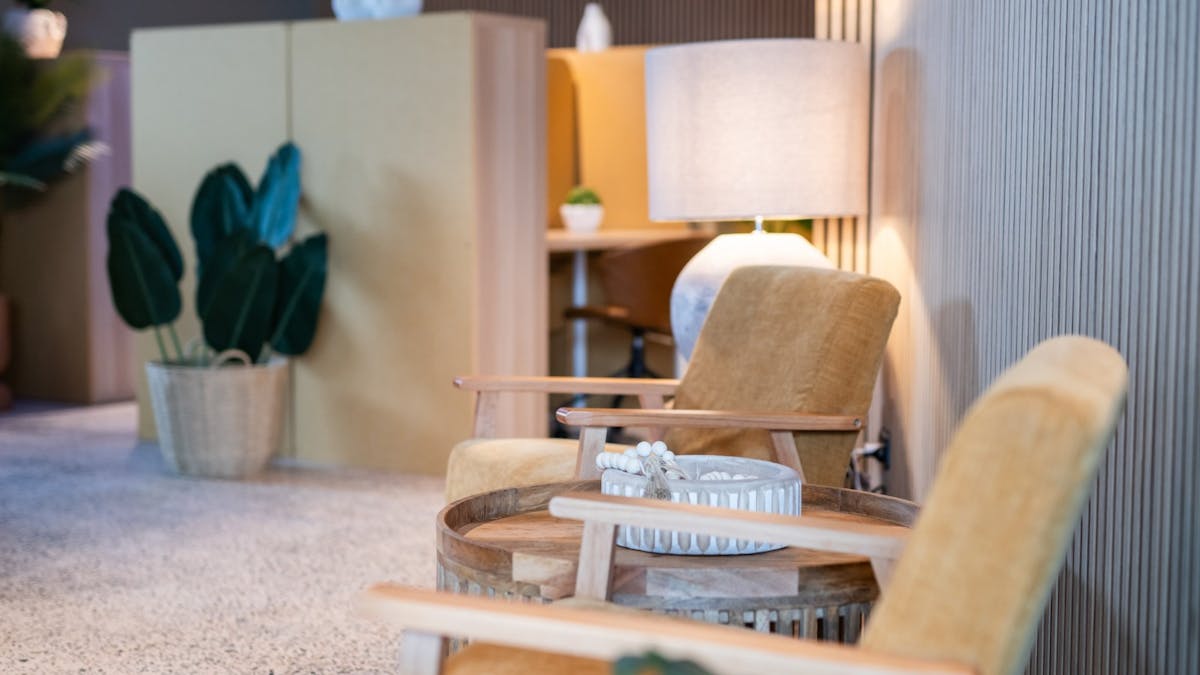 Cosy Wi-Fi lounge with natural light and casual seating for remote workers.