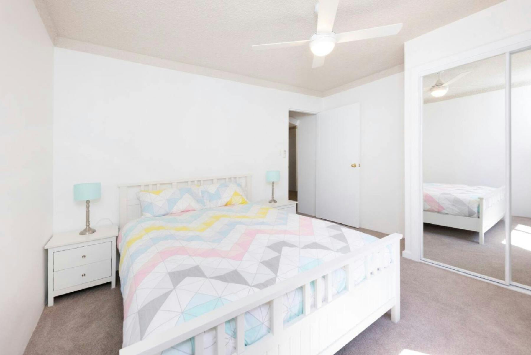 Bedroom with Queen bed, built in wardrobe and ceiling fan