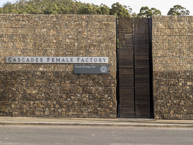 Cascades Female Factory Entrance. High sandstone walls at each side of the gate.