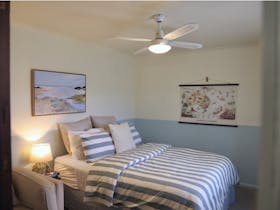 Sleep in ultimate comfort in cosy queen bed, fitted with bamboo/cotton sheets and linen cover.