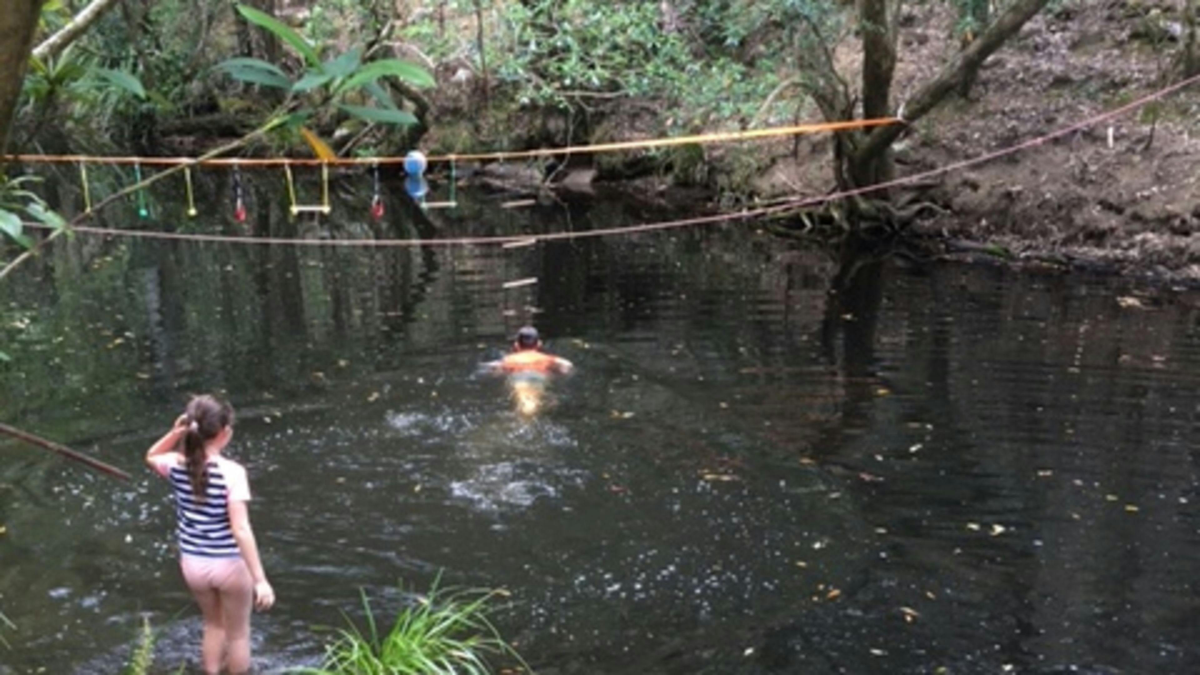 Easy river bank access to deep spot in the river, mind the rocks!  And a chair to have a wine while you watch the kids!  