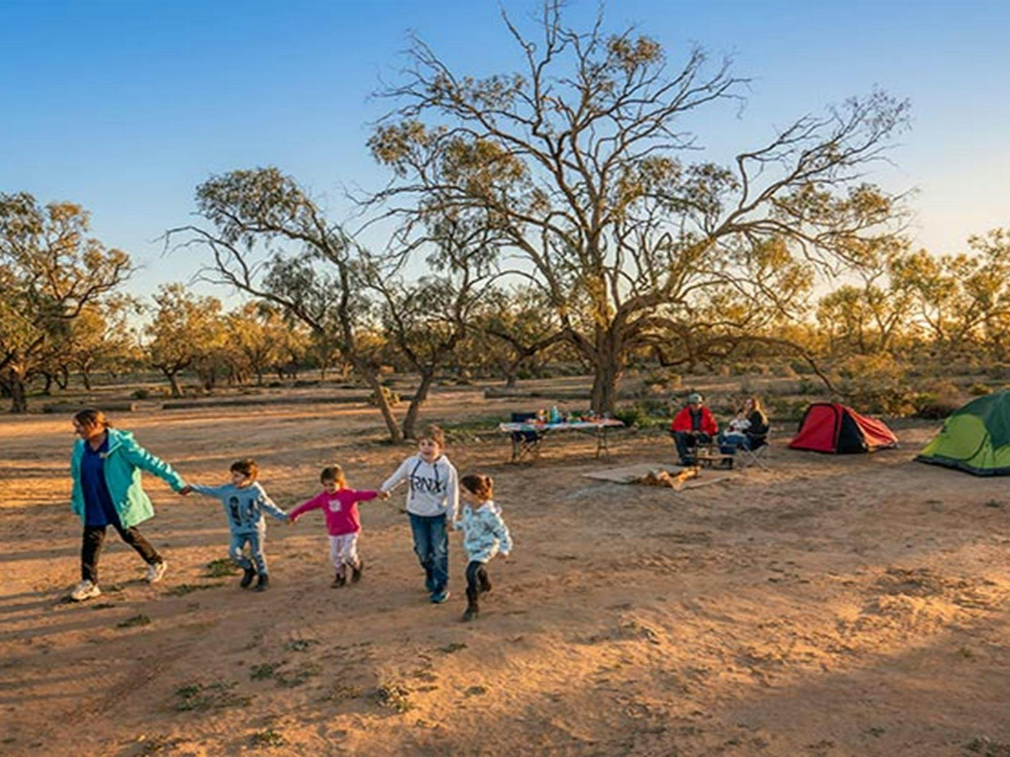 Little kids heading off for a walk at Emu Lake campground. Photo: John Spencer/DPIE