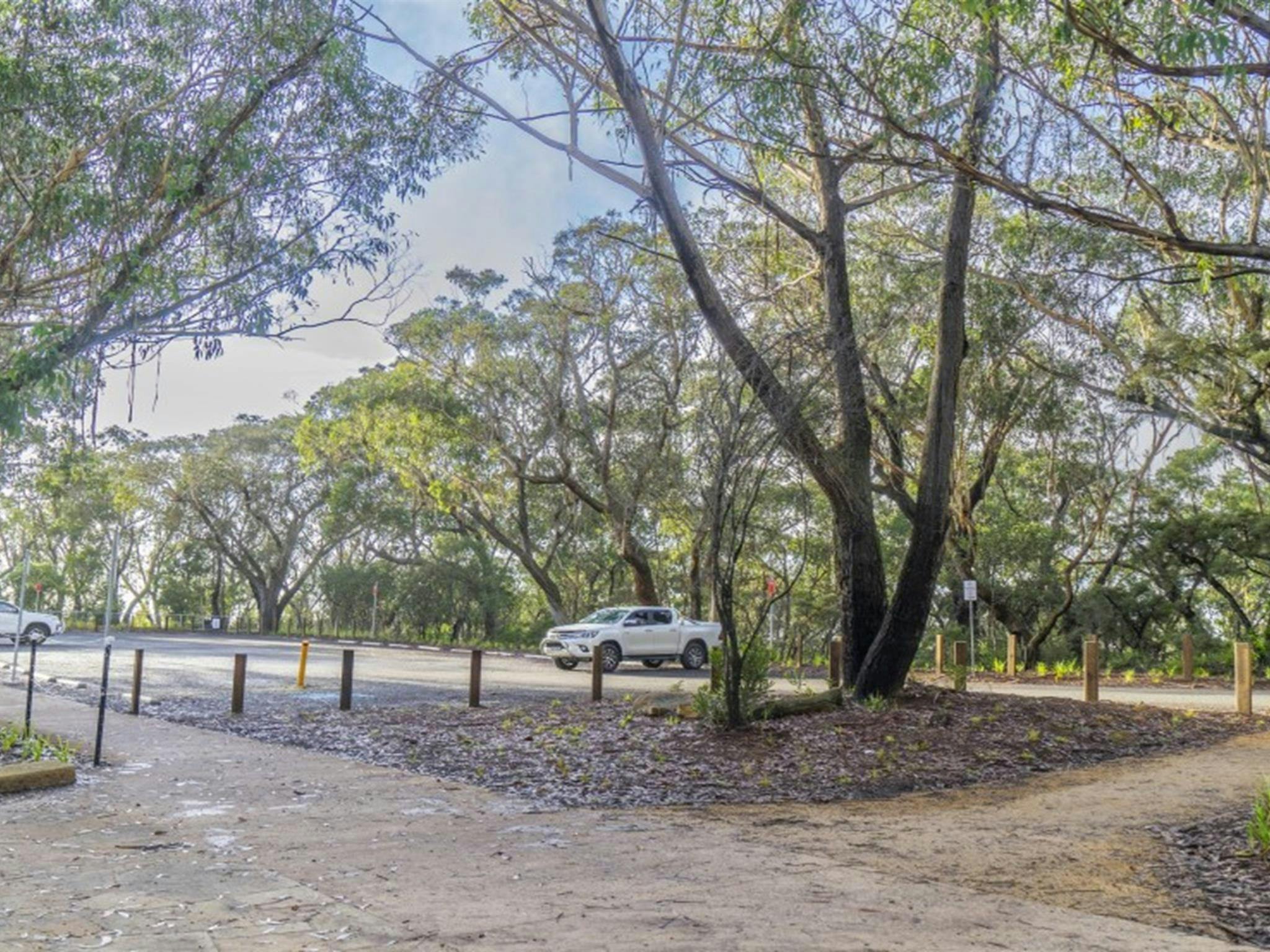 The carpark and the path to Evans lookout in the Blackheath area of Blue Mountains National Park.
