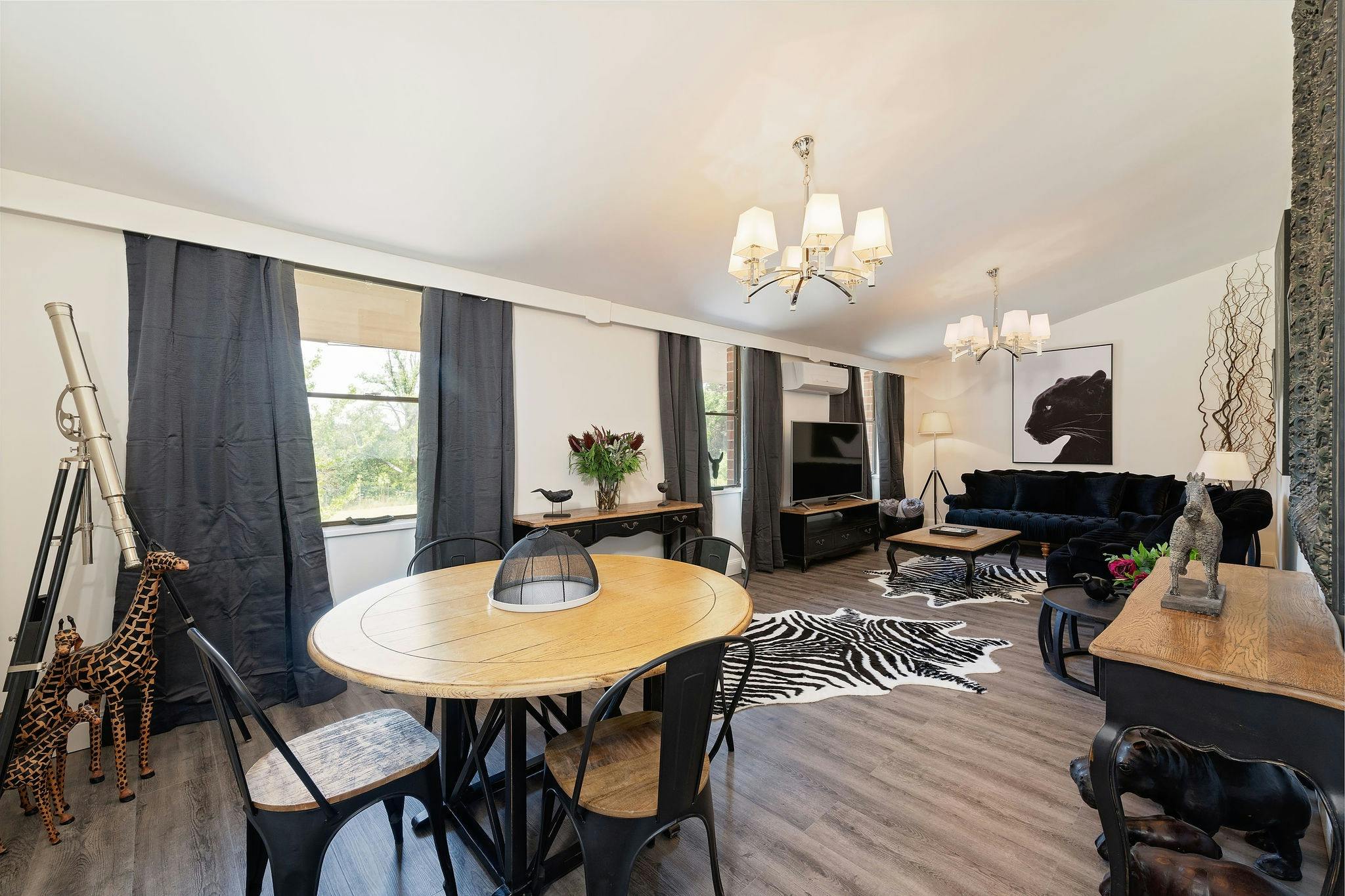 Huge lounge/ dining area looking over the gardens