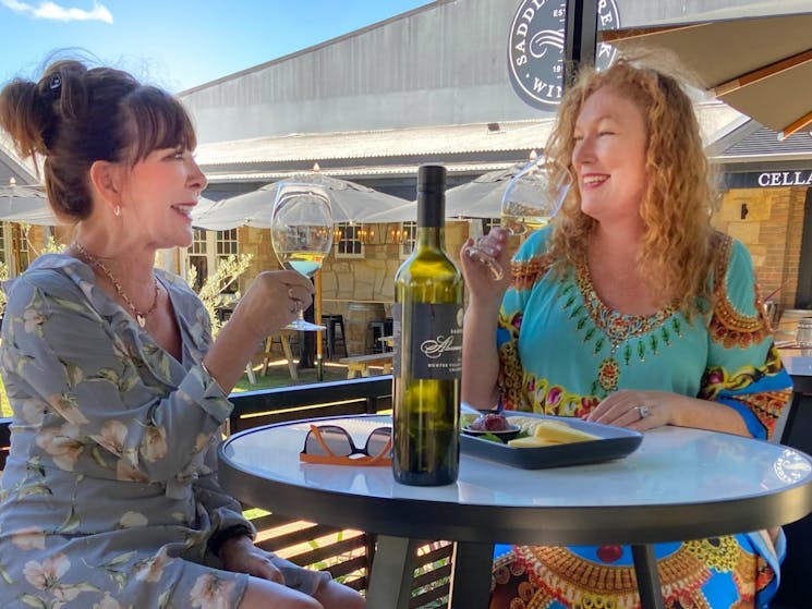 Visitors can wine & chill with a bottle of wine on our garden deck