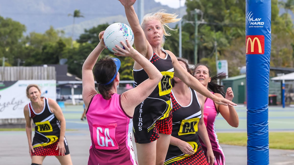 Netball player defending the ball