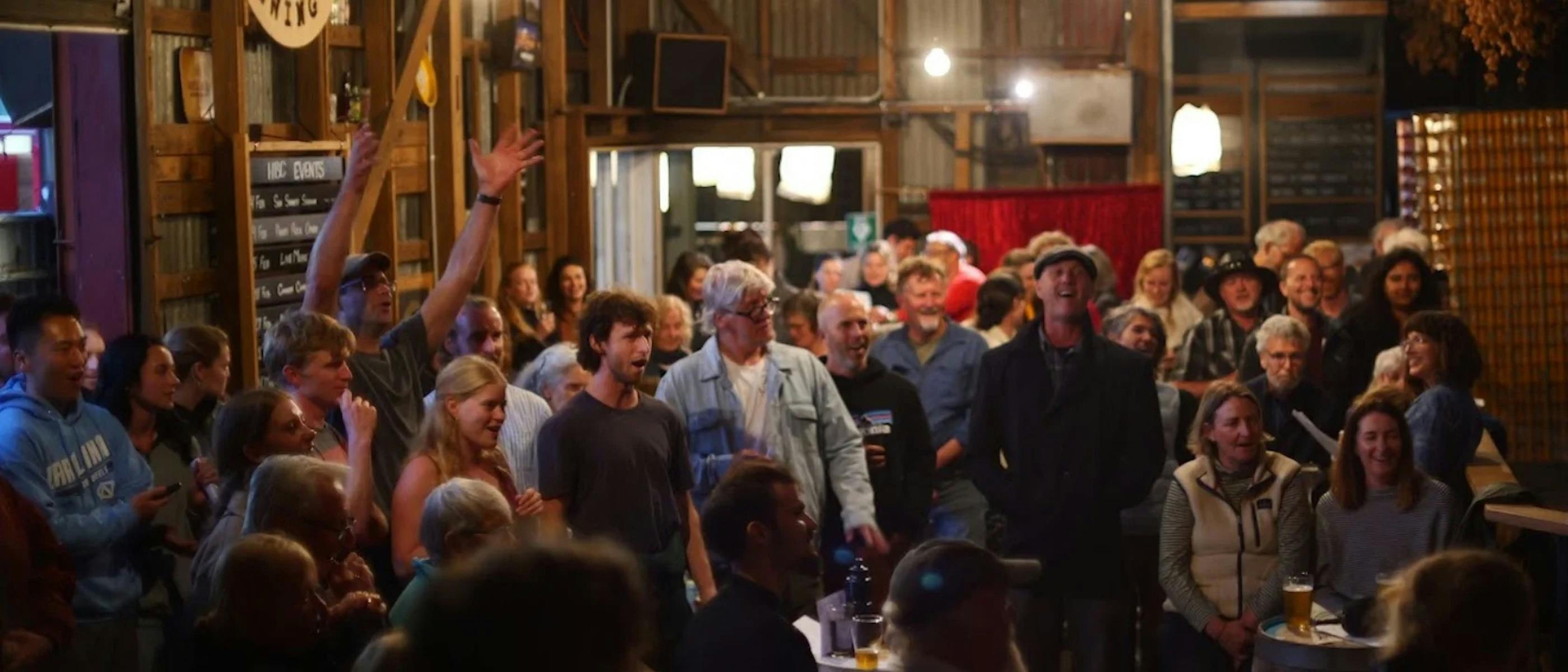 A group of singers in a pub