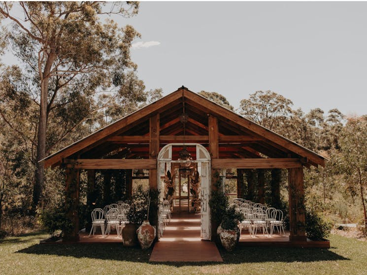 Wedding Chapel that can seat up to 140 guests with open air sides and jasmine growing over ceiling
