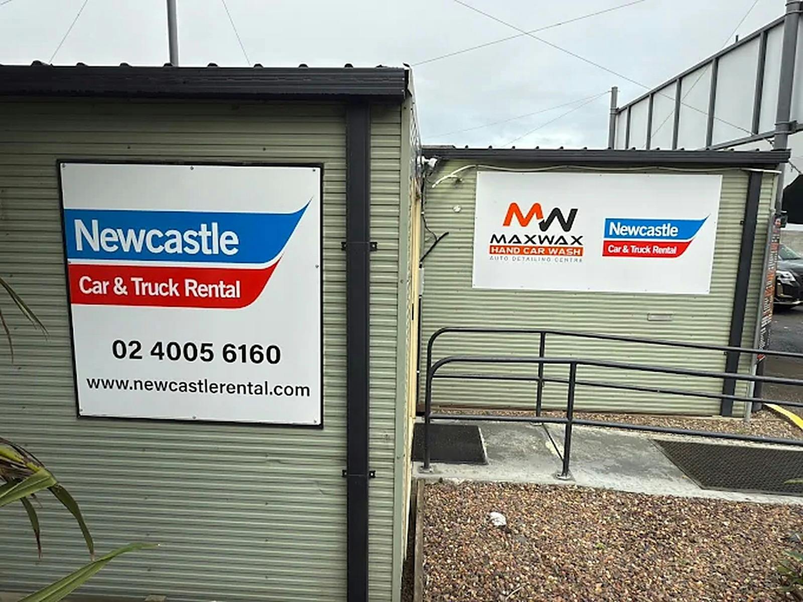 Newcastle Car & Truck Rental Maitland office sign with phone 02 4005 6160
