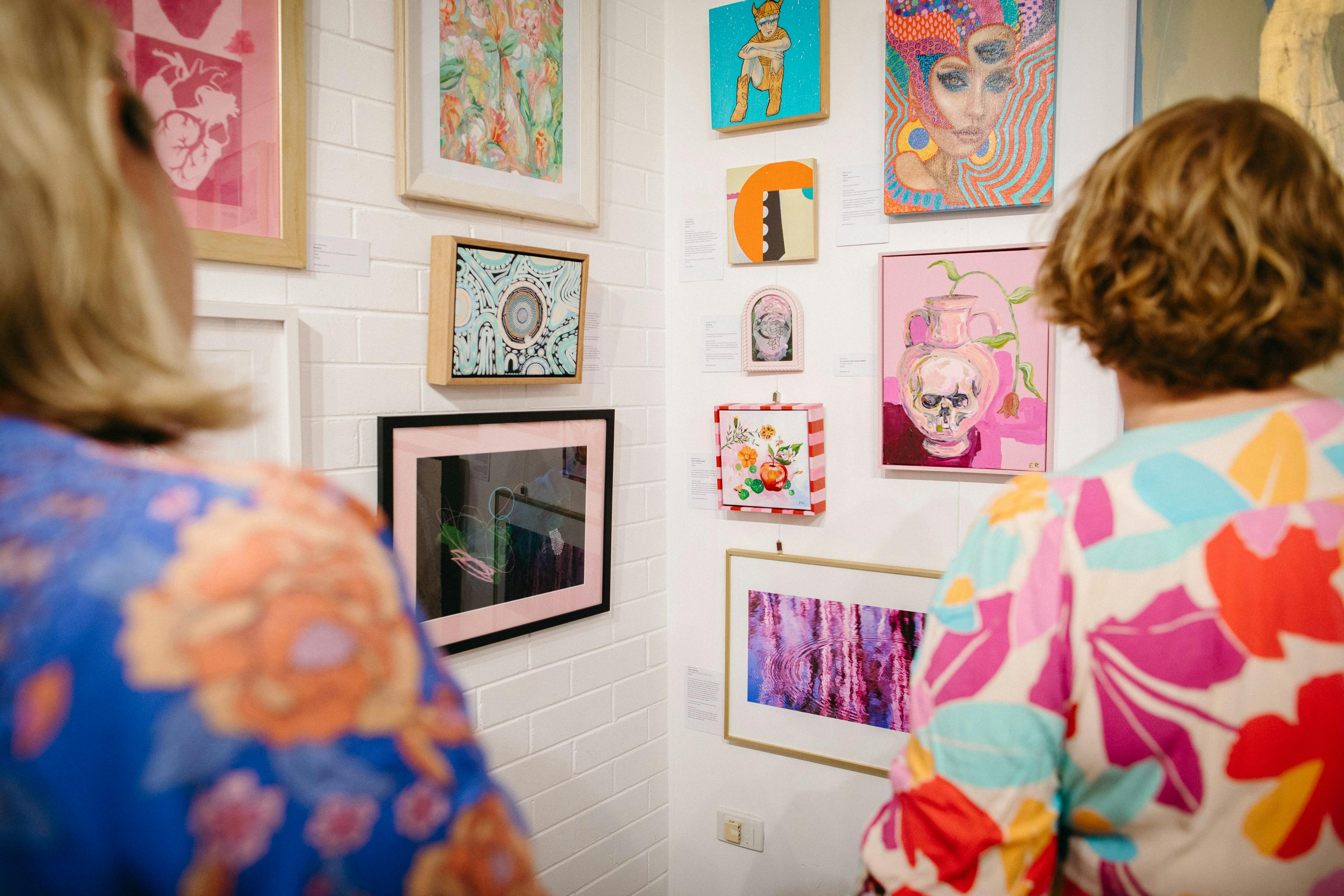 Pink and awesome art on the walls at the Fairy Floss Fantasy exhibition