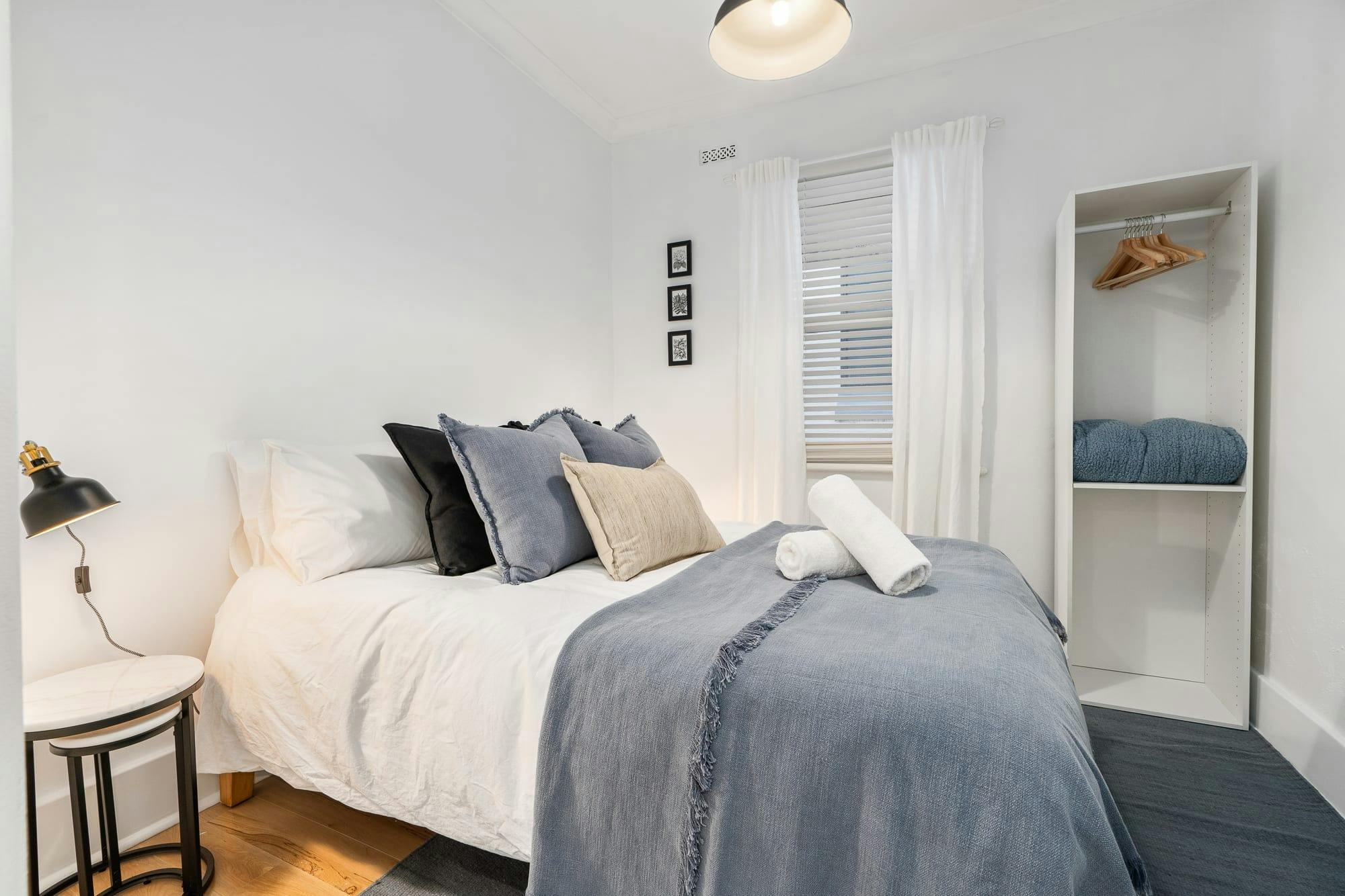 Queen bed with shelving