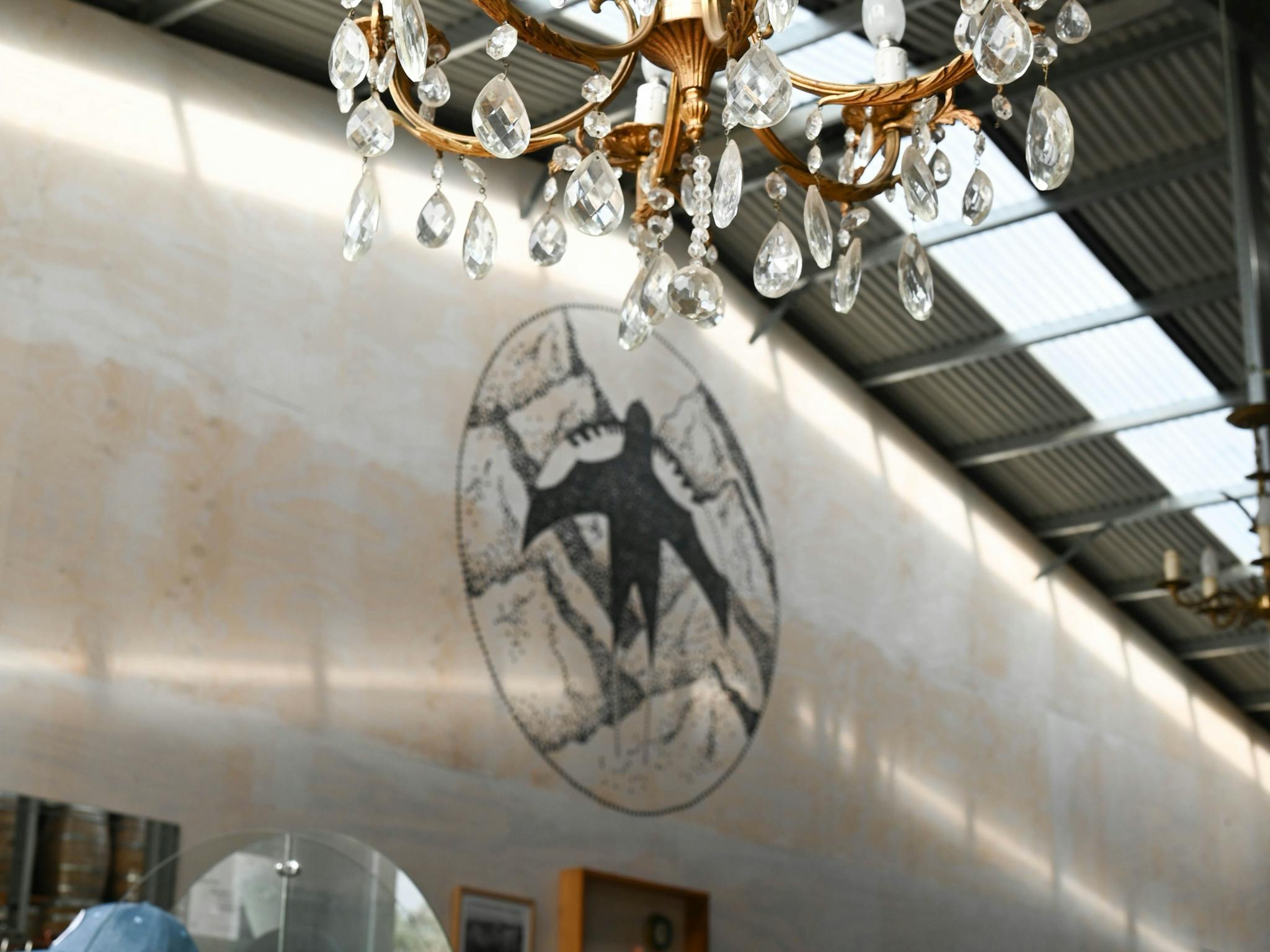 sparkling chandelier in Swiftcrest Distillery