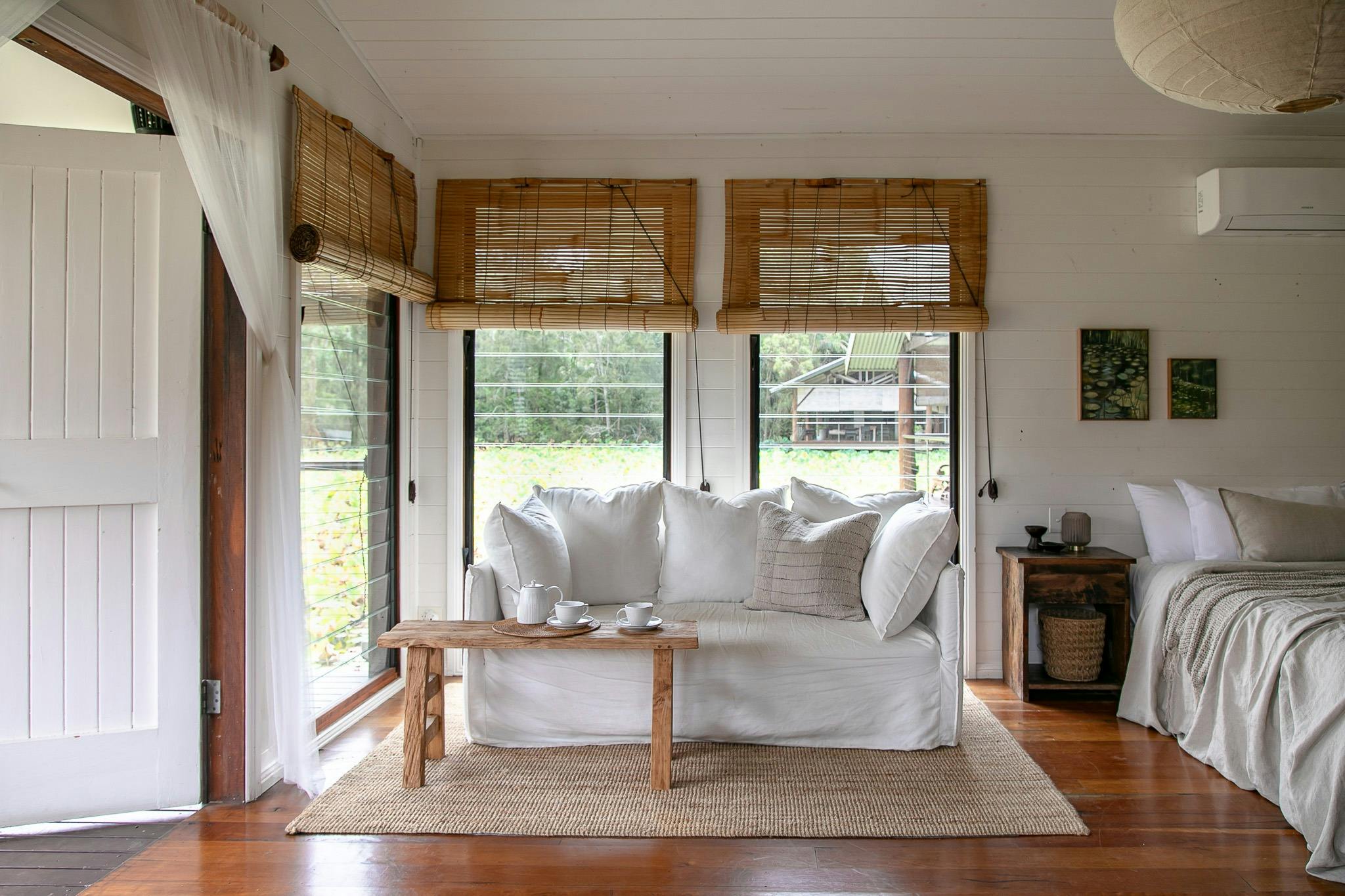 Comfortable open plan king boathouse with luxury linens