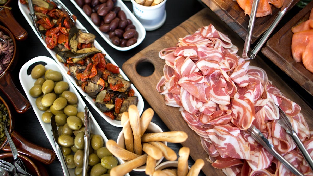 A top down shot of delicious antipasto food platters