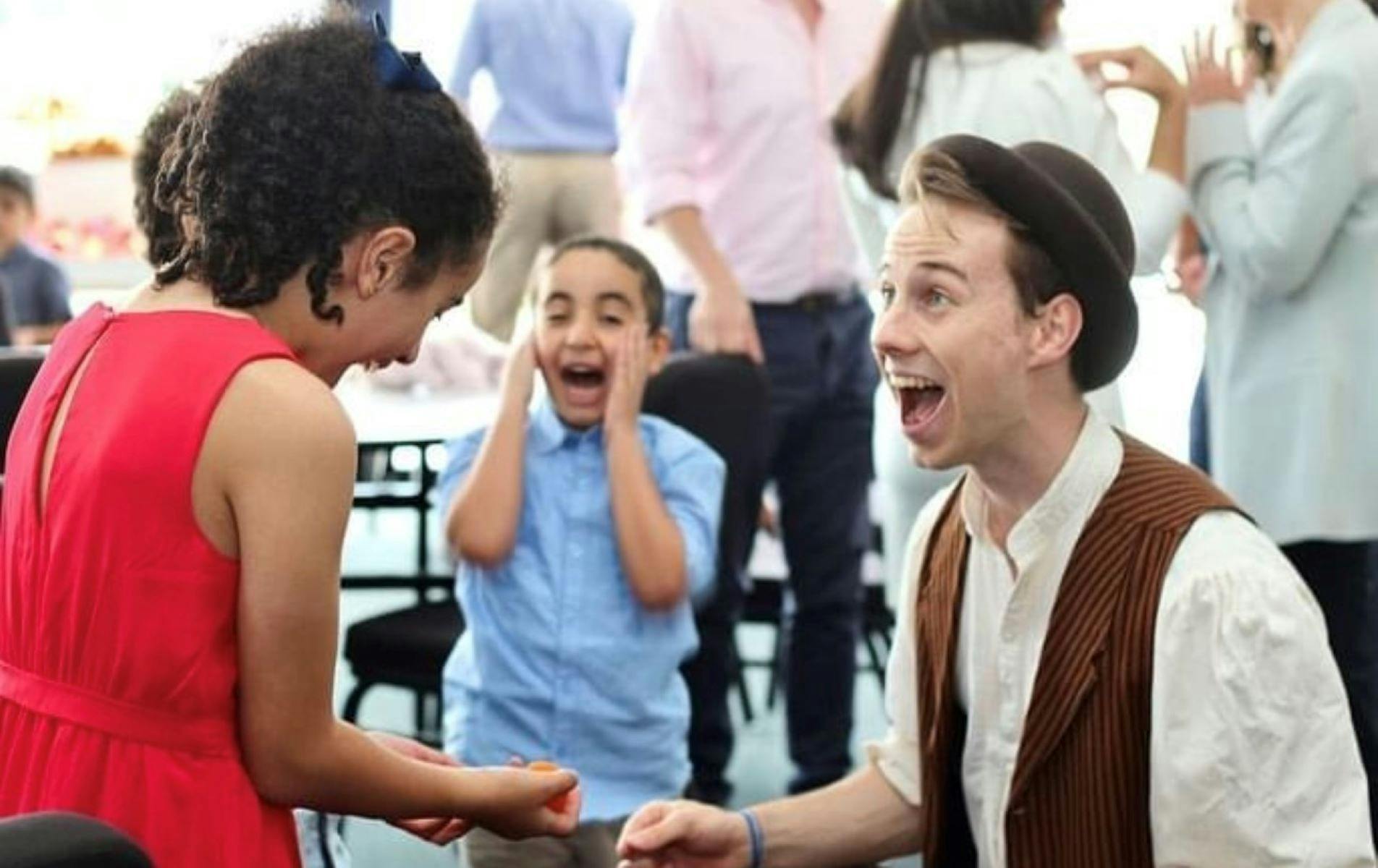 Magician entertaining children