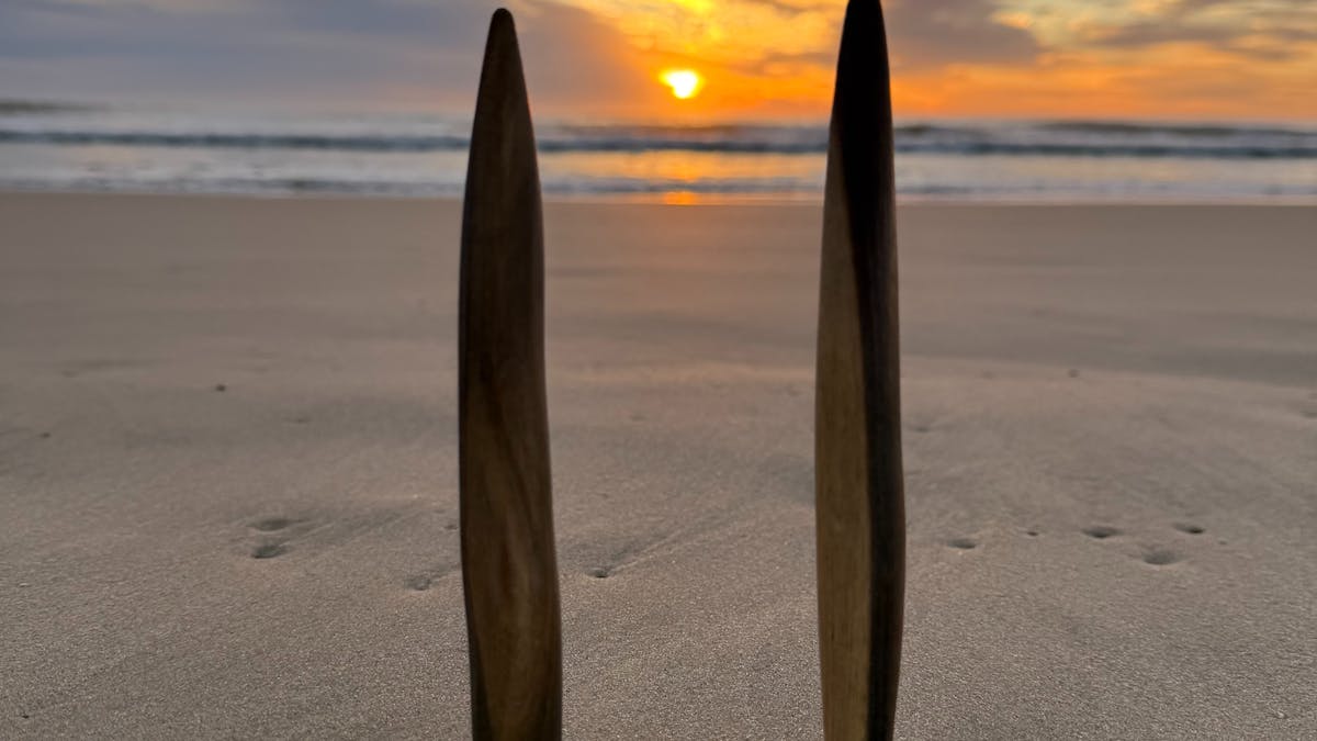 sunrise on K'gari/clapsticks in the sand