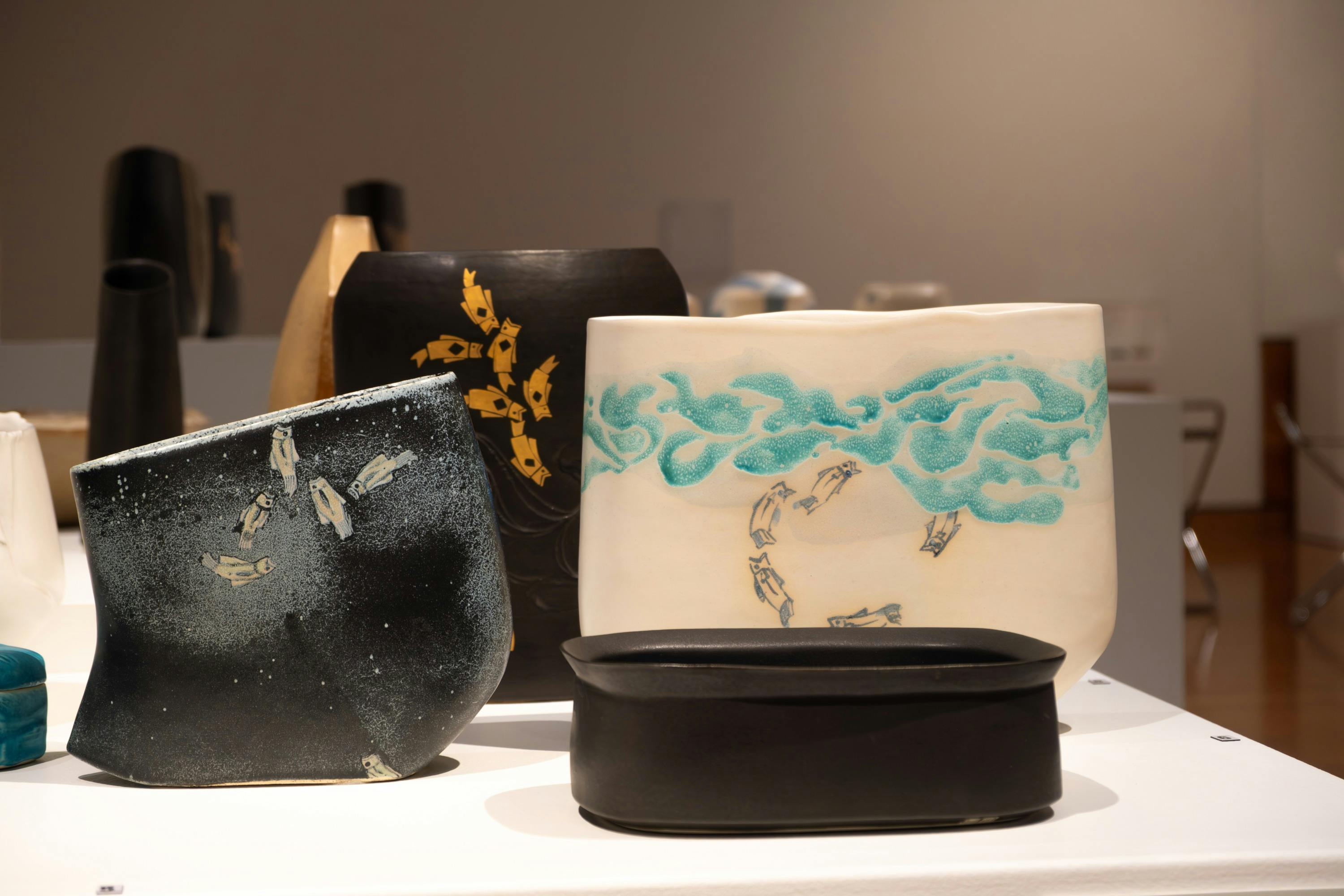 Ceramic pieces by Hiroe Swen with fine details