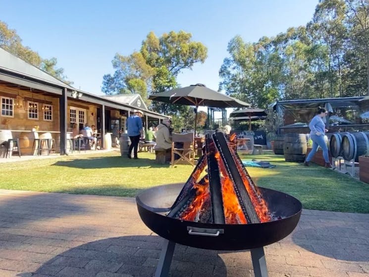 Stay warm by the fire pits in Saddler's Creek wine garden