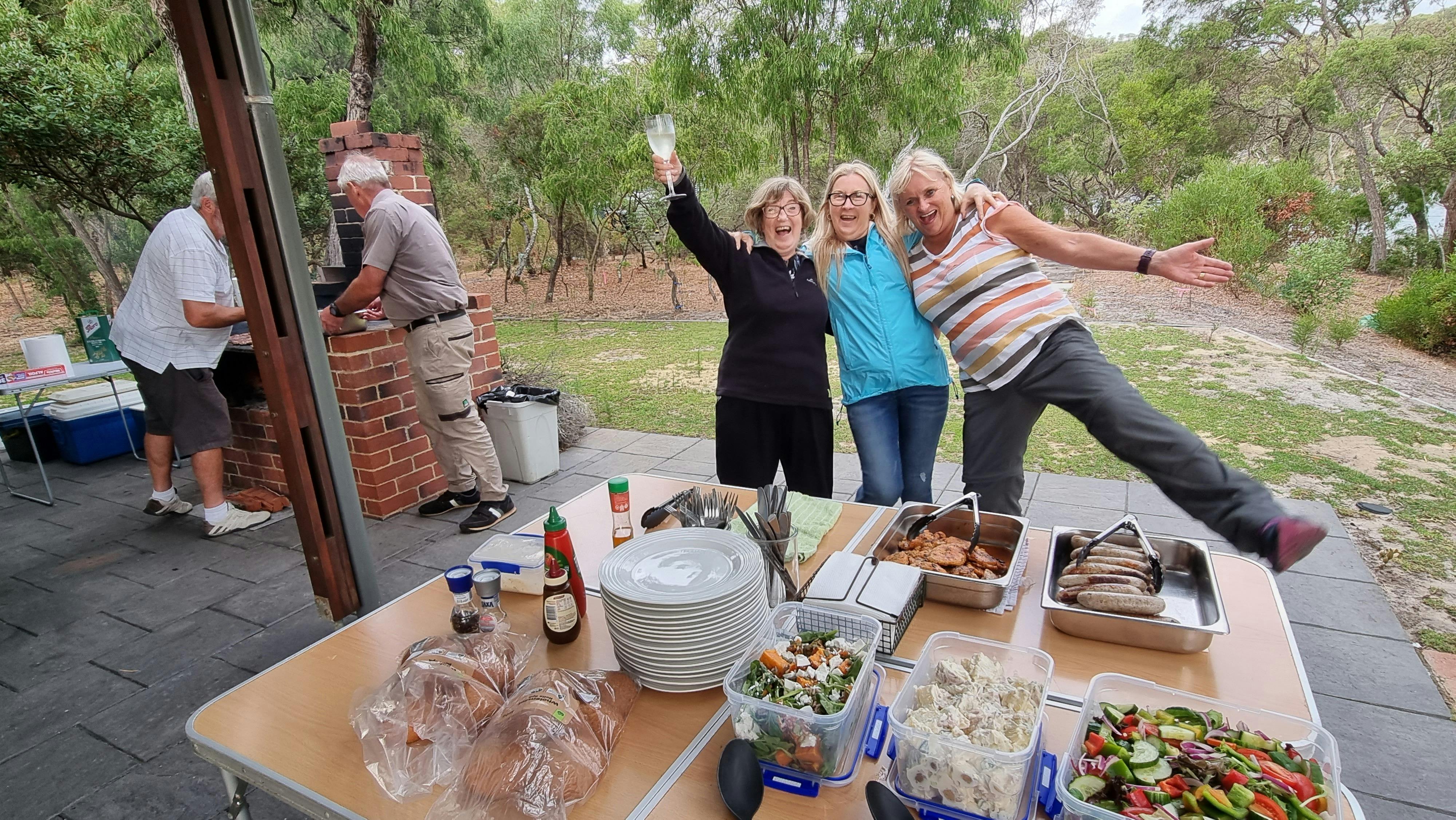 3 ladies posing for photo at BBQ on Donnelly River