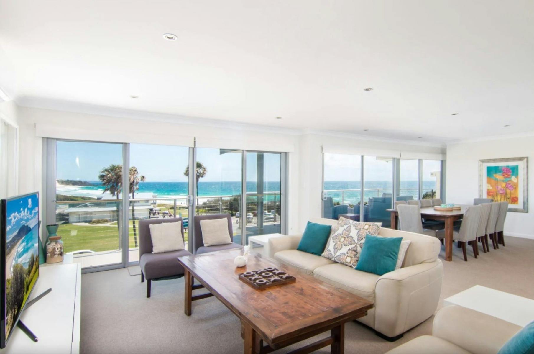 Lounge room looking out onto balcony and ocean view