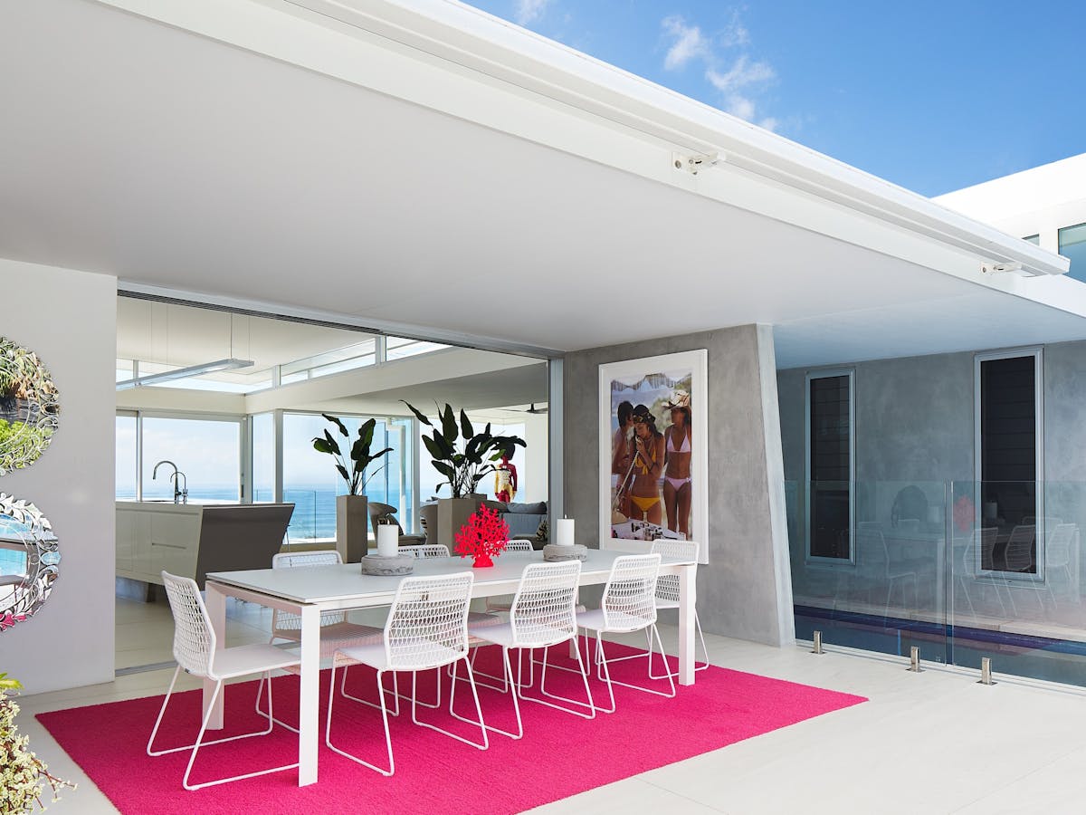 Outdoor dining table, pool view