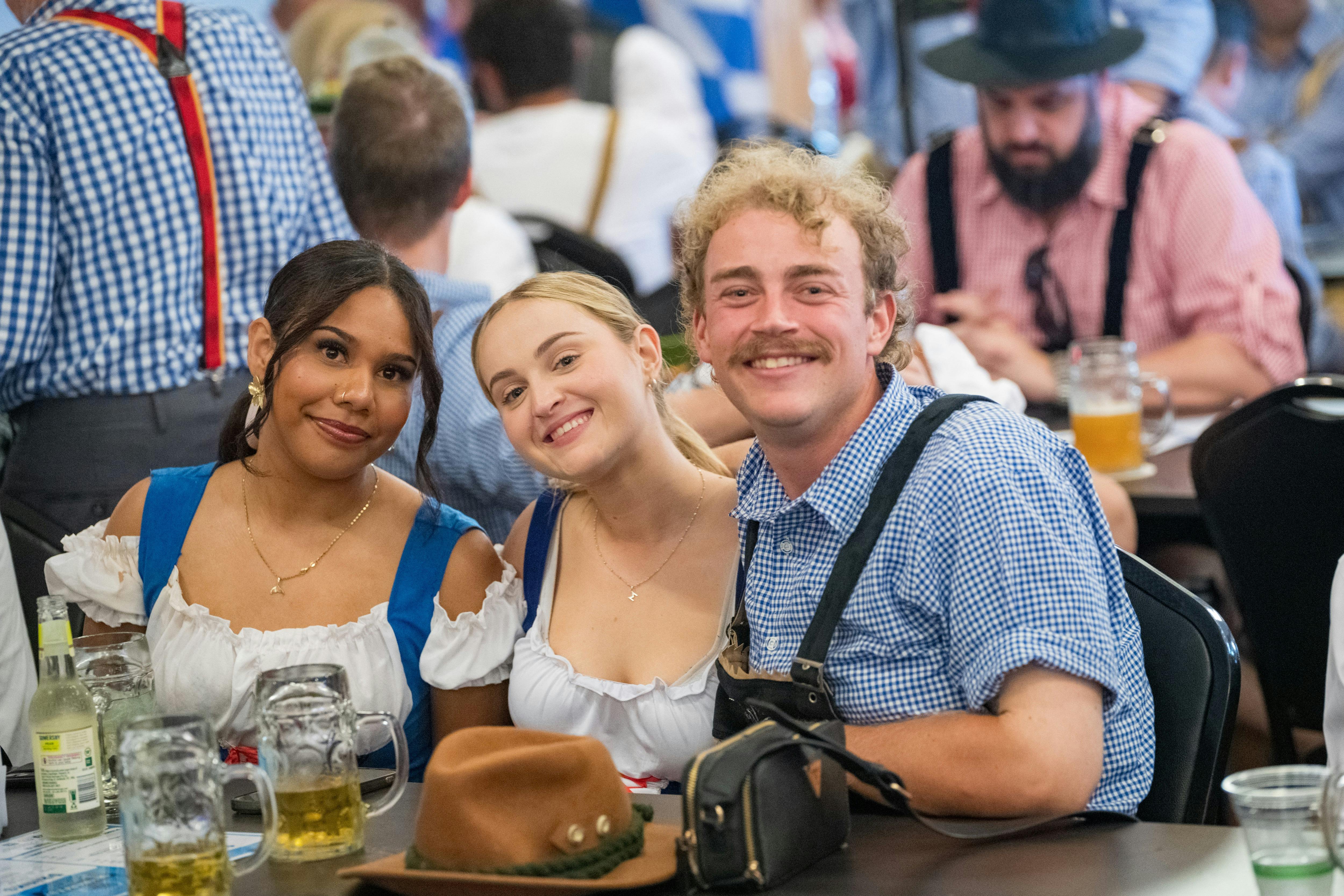 Three people at Oktoberfest