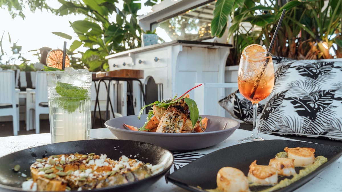 photo of different dishes and drinks at The Garden Bar, Airlie Beach