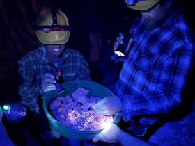 The group is sorting through some freshly discovered opal.