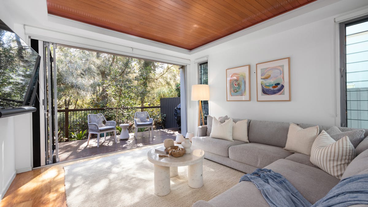 Living with stacking doors opening to nature park