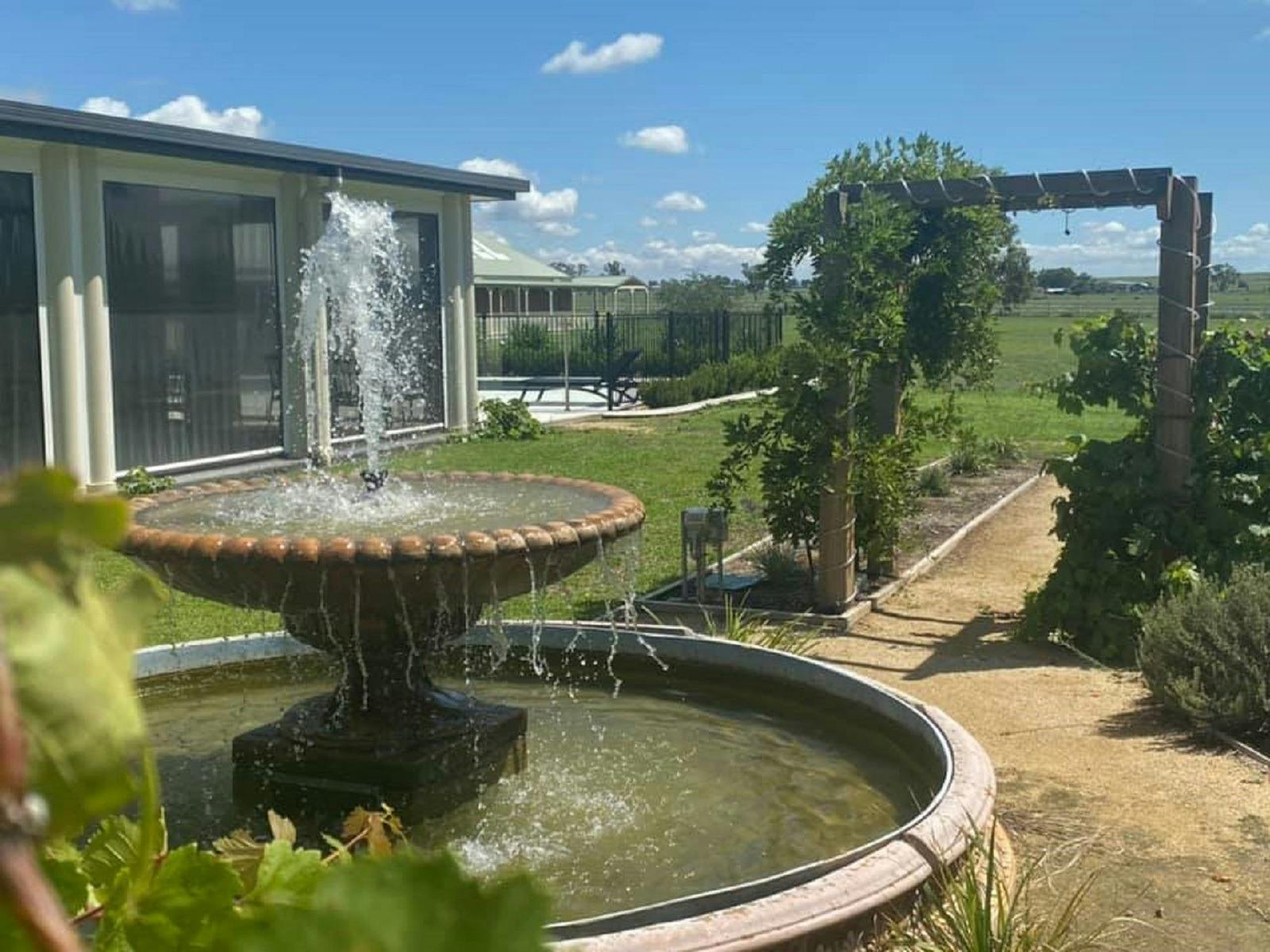 Water fountain and gardens at Stockmans Motel