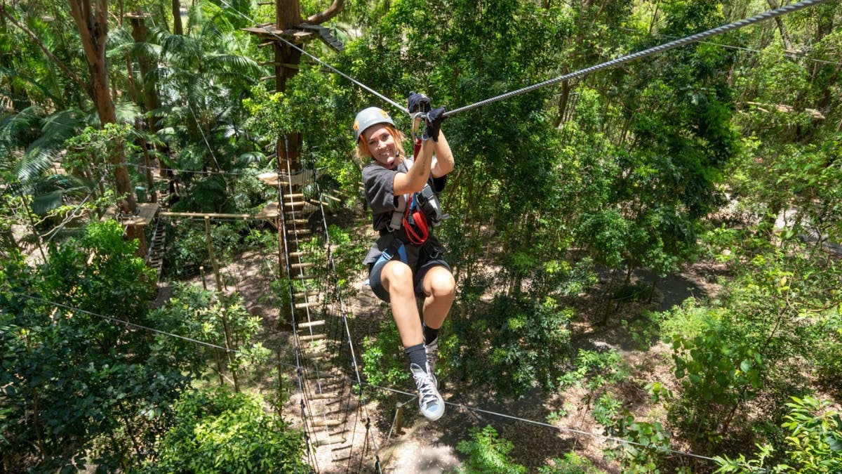 Girl zipline adventure heights