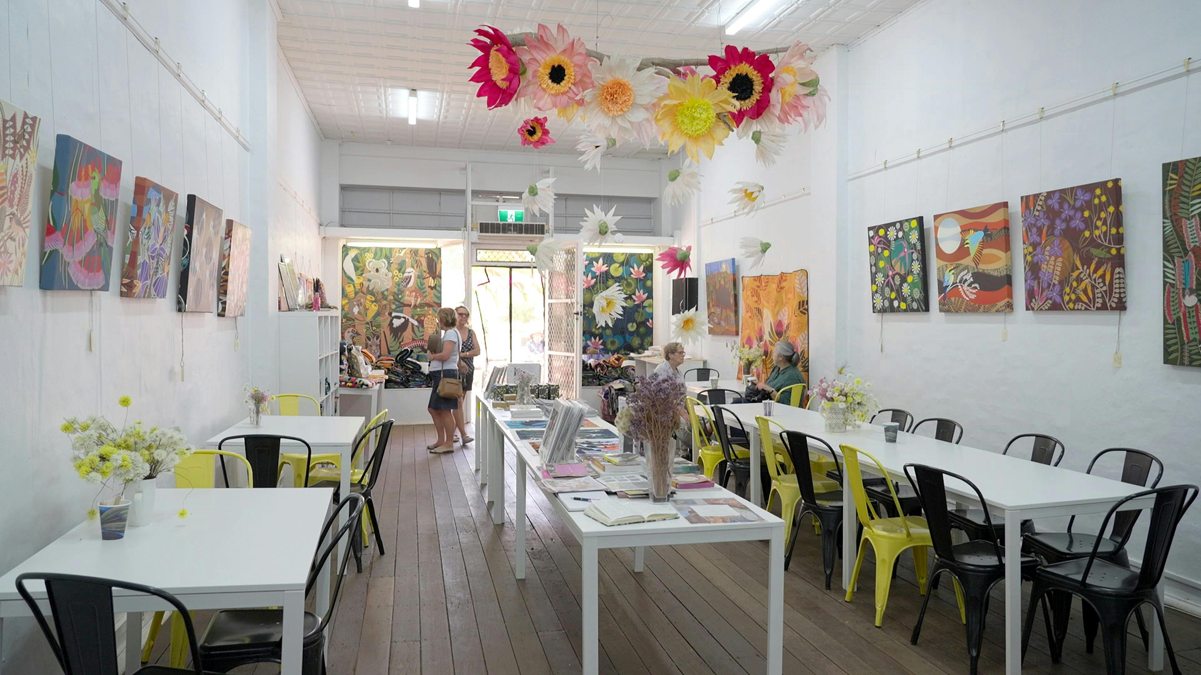 Visitors explore an exhibition of local artwork at the Helen Ansell Art Gallery in Mullewa.