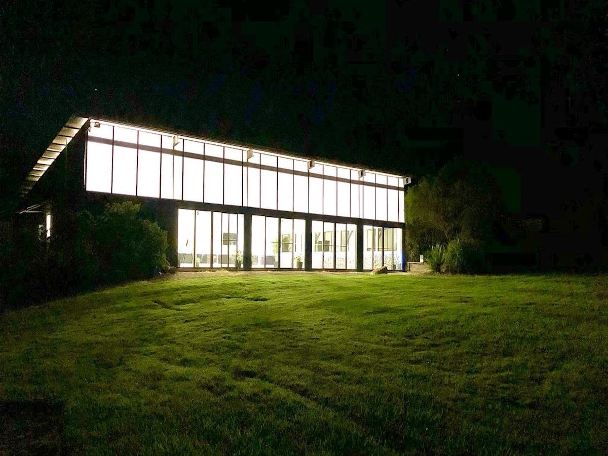 View of the Training Centre light up at night time
