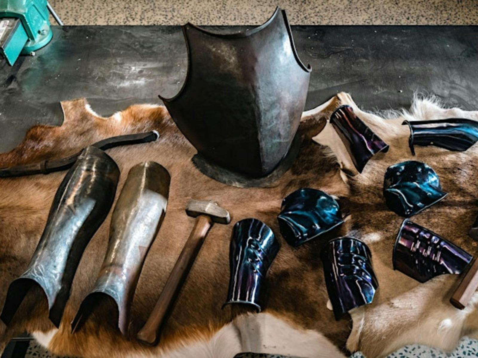 Armoury on display on animal skin on table