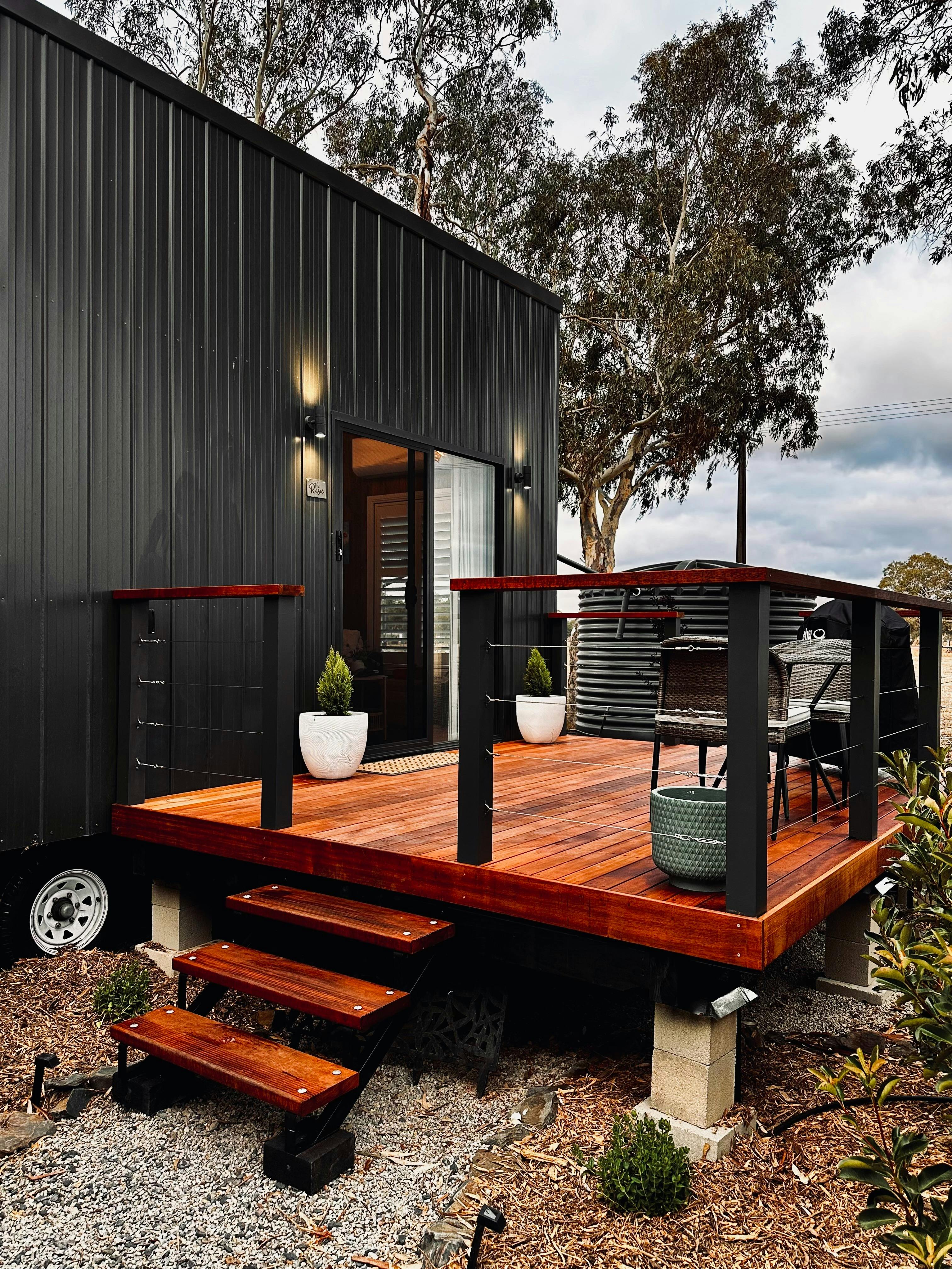 Outdoor deck to main entrance. BBQ and outdoor seating.