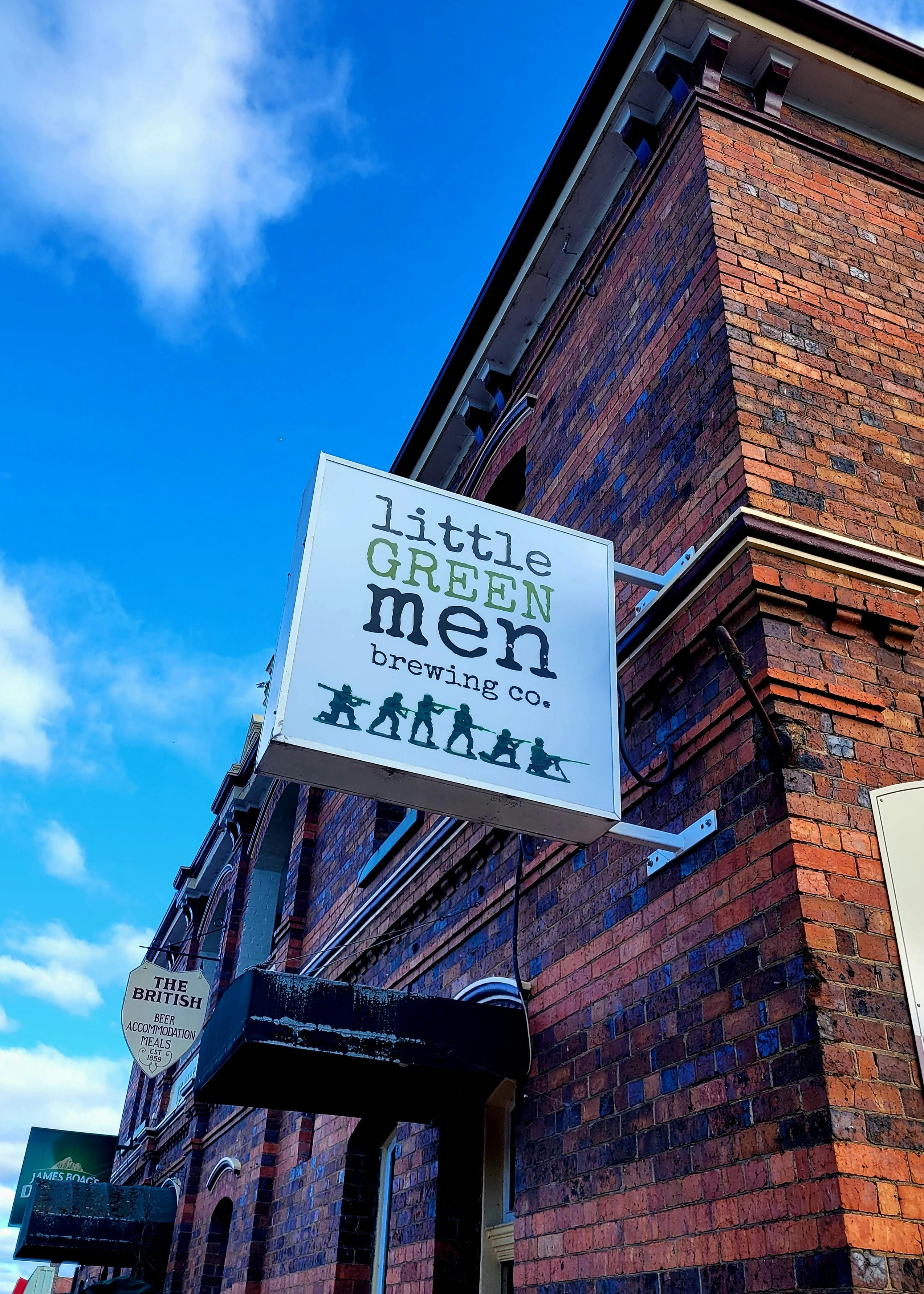Street signage over the front door of the establishment