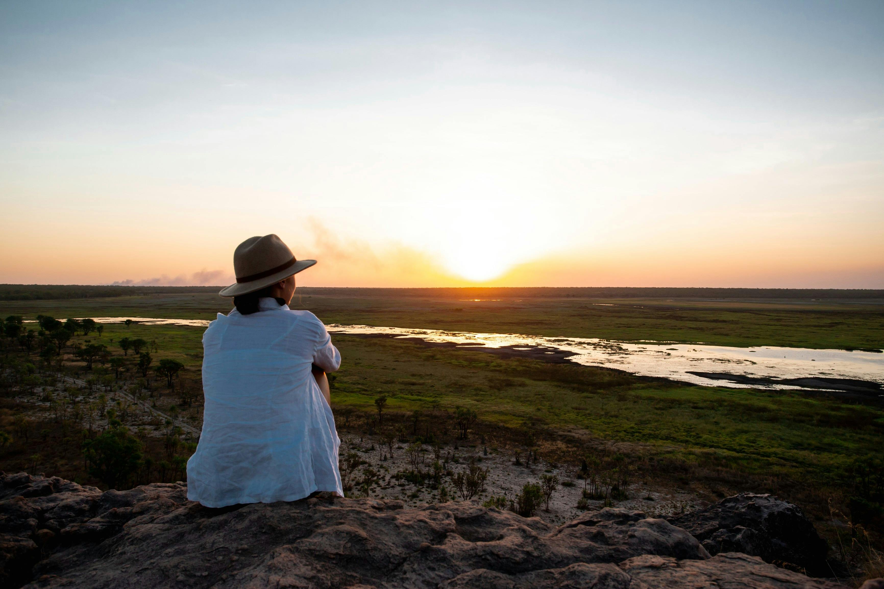 woman watching sunset