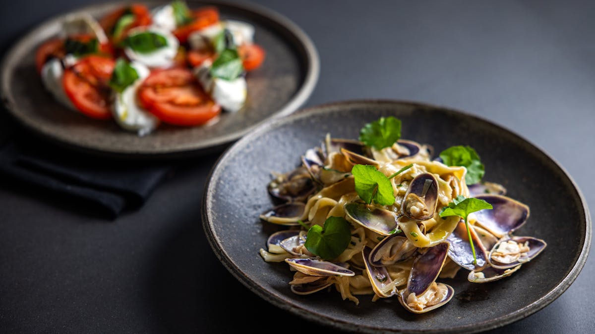 Caprese Salad, Linquini Vongole with Champagne butter sauce