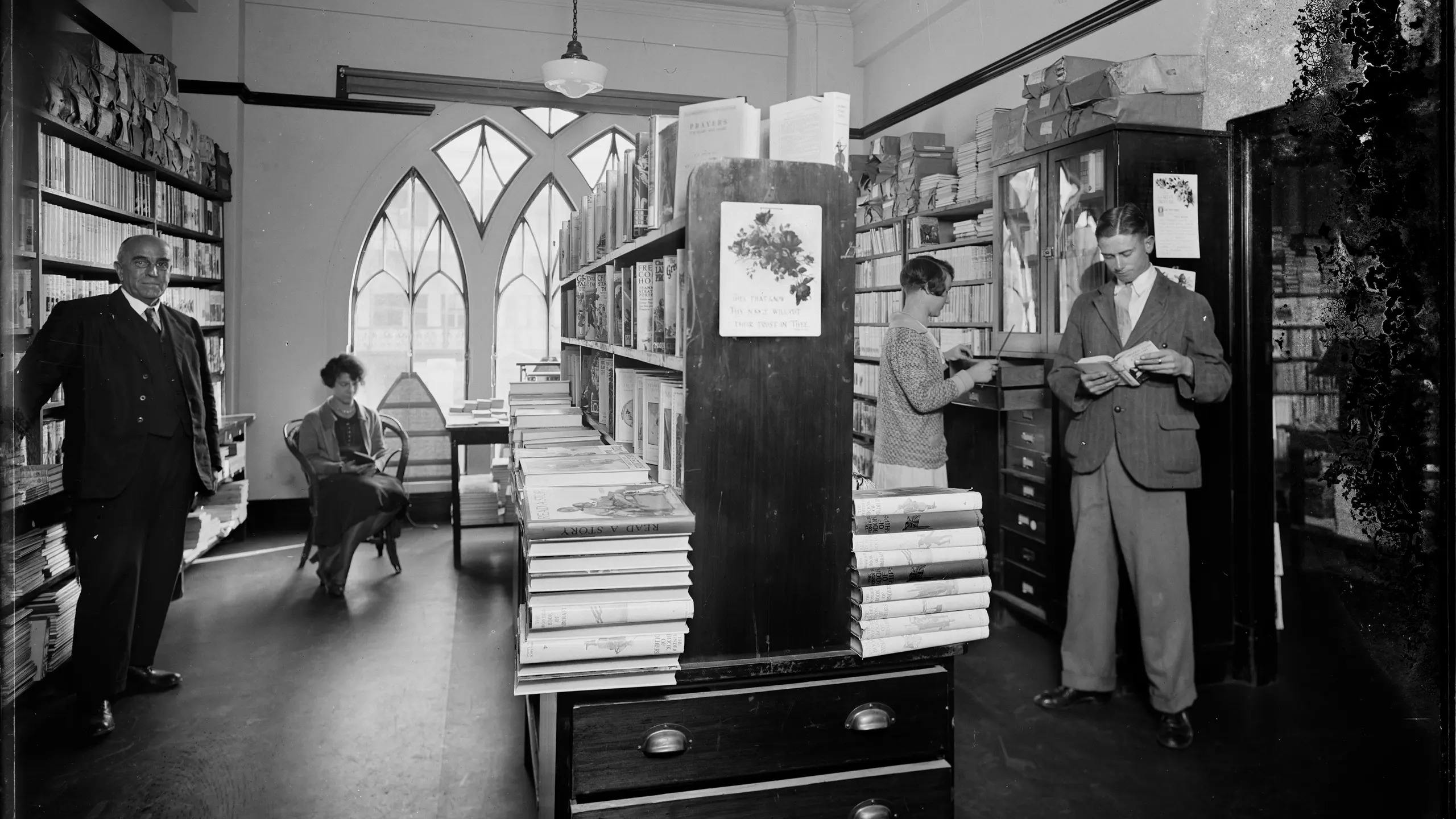 'People browsing in a library' glass plate negative. Image: Powerhouse Collection