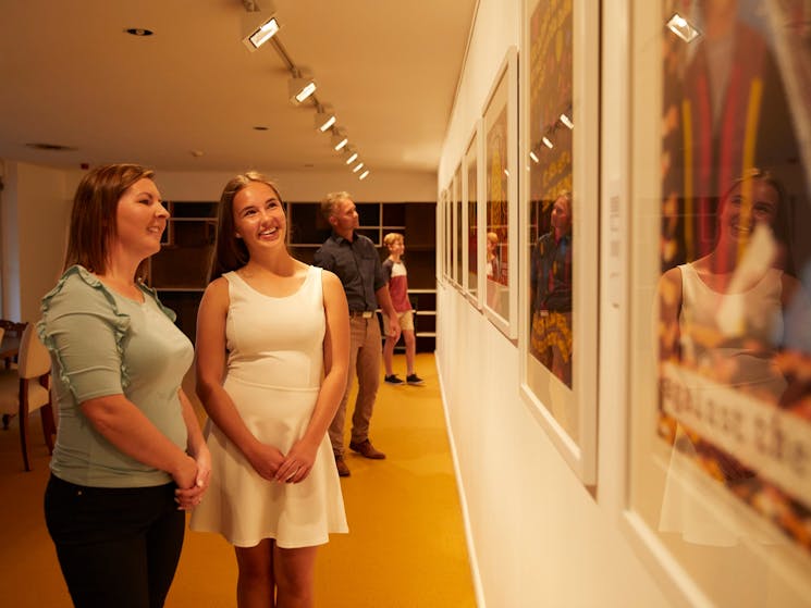 Family enjoying the art exhibition at the Penrith Regional Gallery in Western Sydney